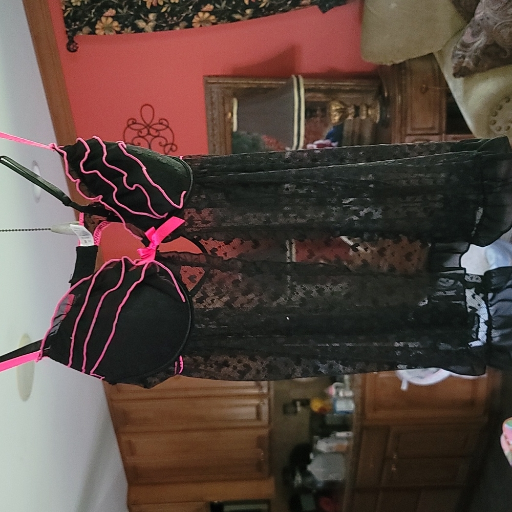 Black lace chemise with hot pink accents